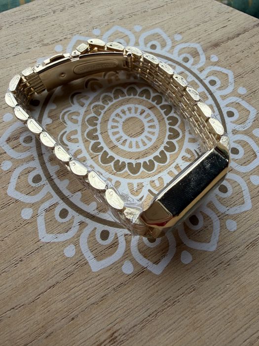 Relogio dourado senhora