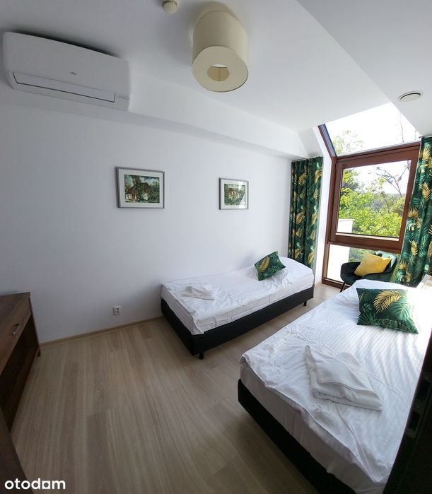 Przestronny apartament z balkonem i windą nad jeziorem Pluszne