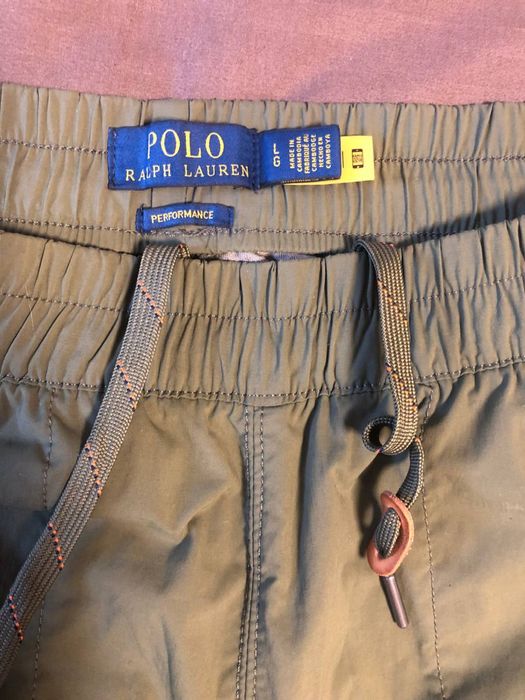 Спортивные Поло ,зеленого цвета ,состояние новых.оригинал .