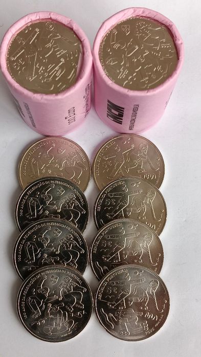 Moedas e rolos dos 100 anos de patinagem
