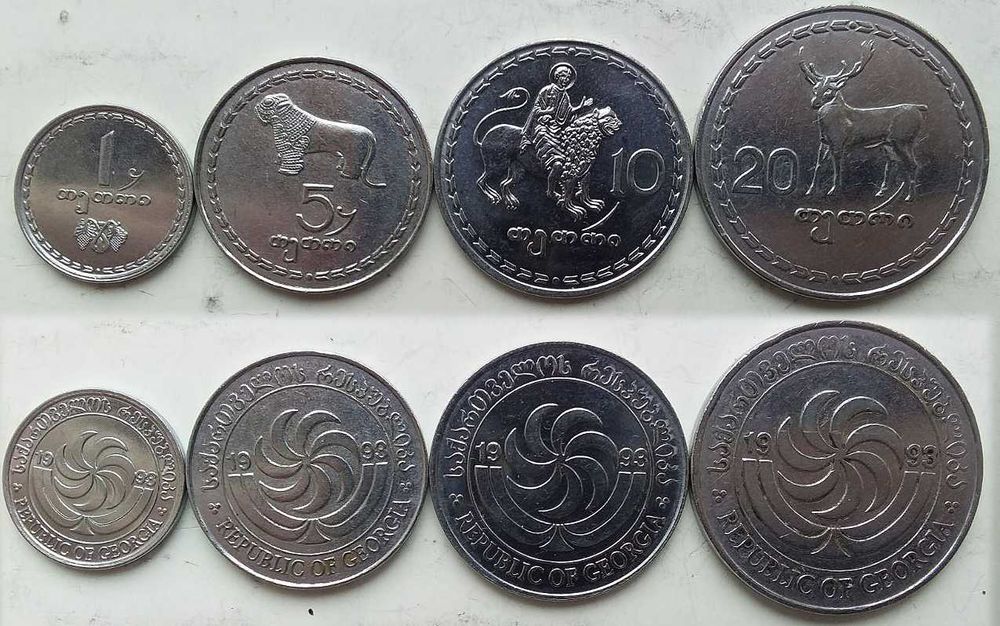 Наборы монет Грузии, Румынии, Швейцарии, Таиланда,