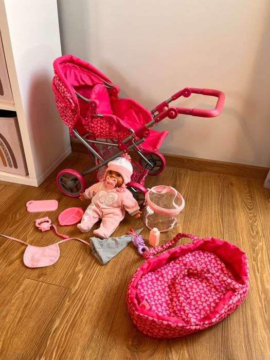 Składany wózek z grającym dzidziusiem