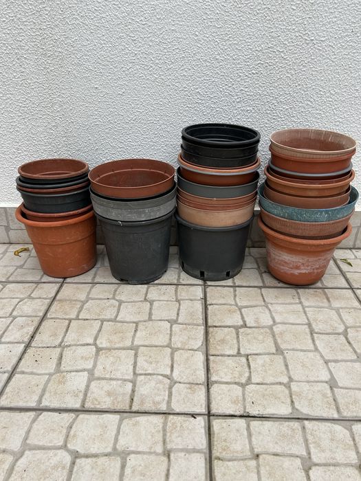 Selling a variety of pots.