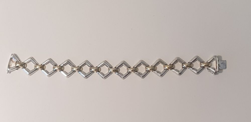 Pulseira semi rígida Prata e Ouro