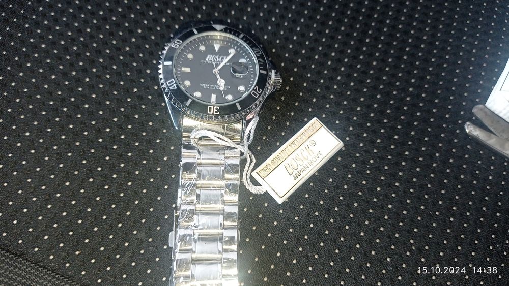 Кварцевые часы в металле