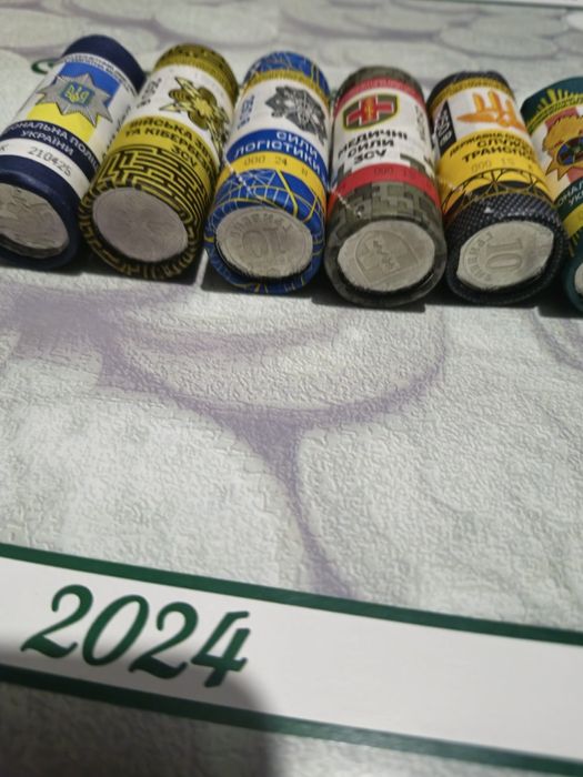 Роли 10-гривневих  монет