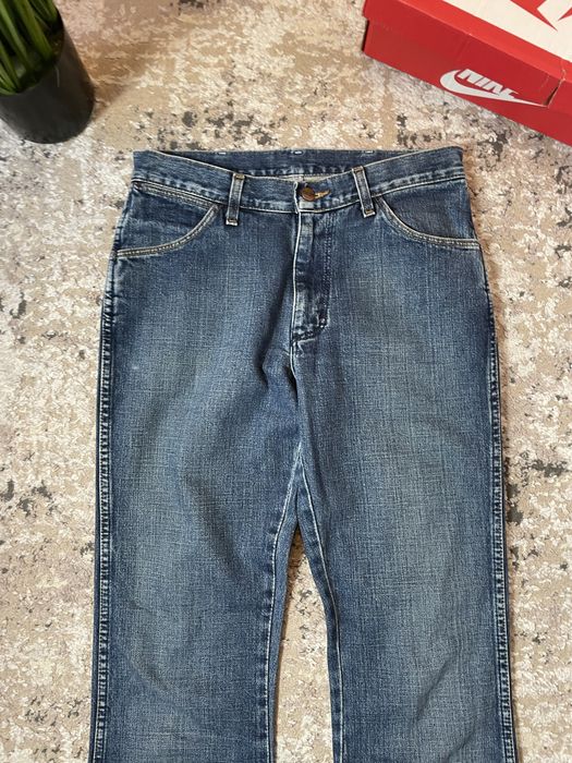 Spodnie jeansowe damskie dzwony wrangler W31L34
