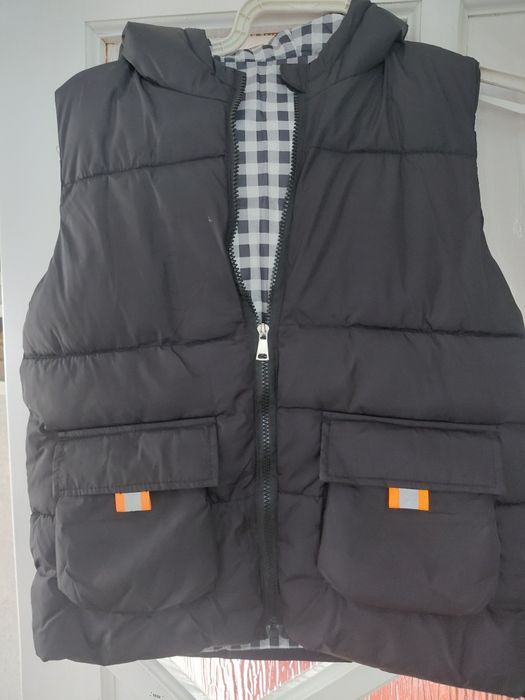 Жилетка, безрукавка