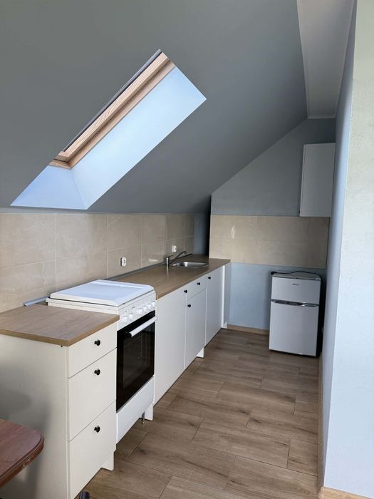 Pokój z aneksem kuchennym