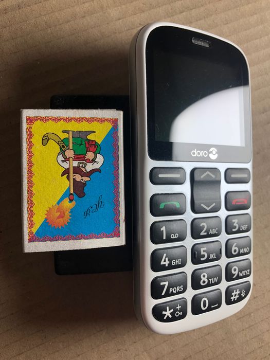 Телефон две симкарты Doro 1326 с докстанцией и зарядным кнопочный.