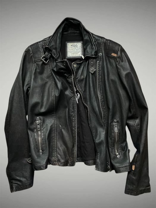 Вінтажна шкіряна куртка