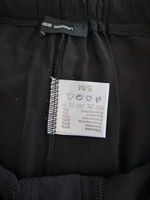 Calças pretas W52 M