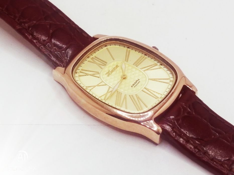 Золотые часы Ника