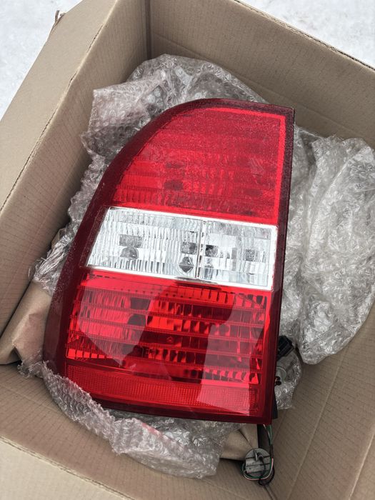 Фонарь задній лівий Kiа Sportage 04-08. Стан нового