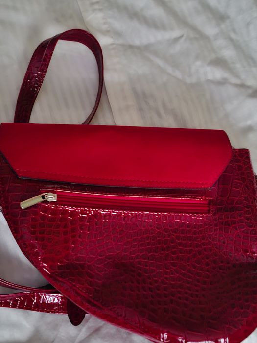 Torebka, siodełko czerwona Abakus.