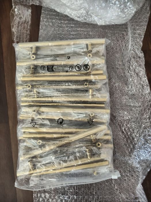 Vendo puxadores armários de inox  dourados novos