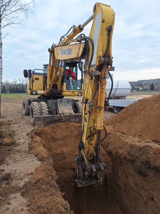 Usługi koparko-ładowarka koparka kołowa