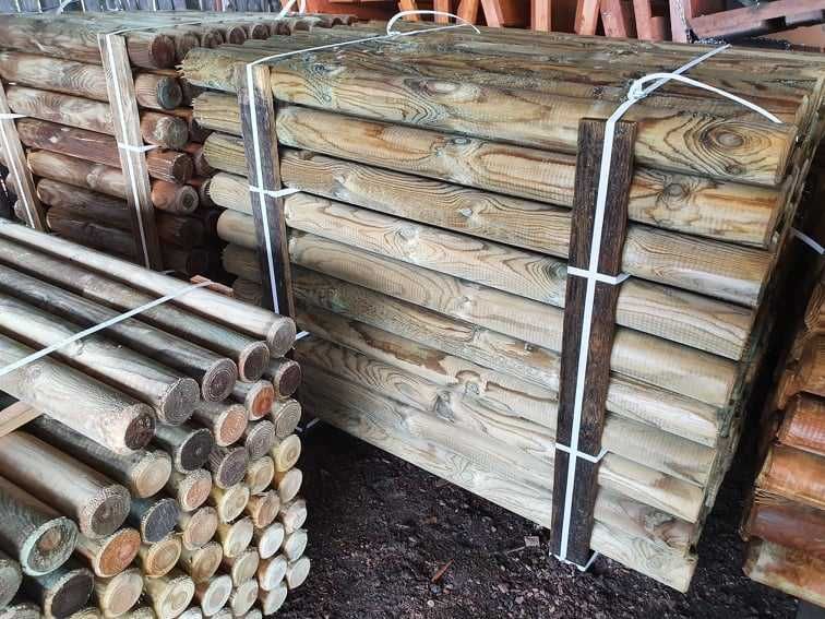 Paliki toczone, słupki drewniane, palisada, huśtawka