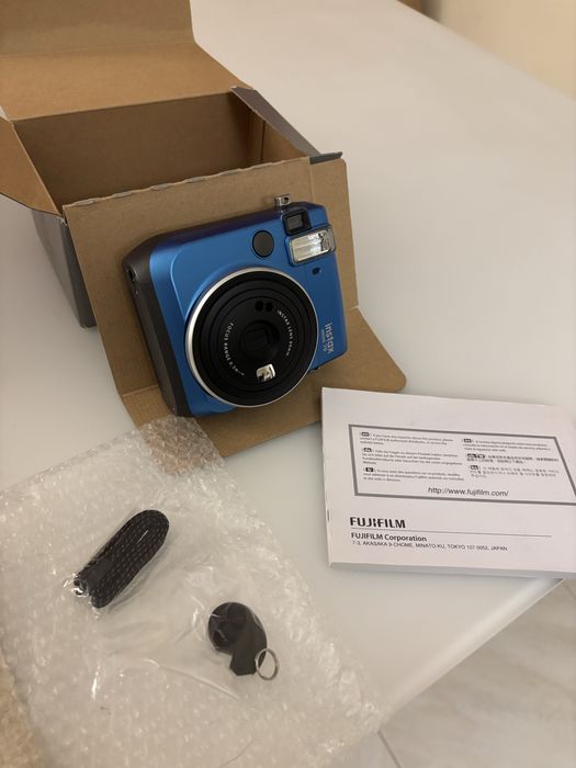 Instax mini 70 como nova