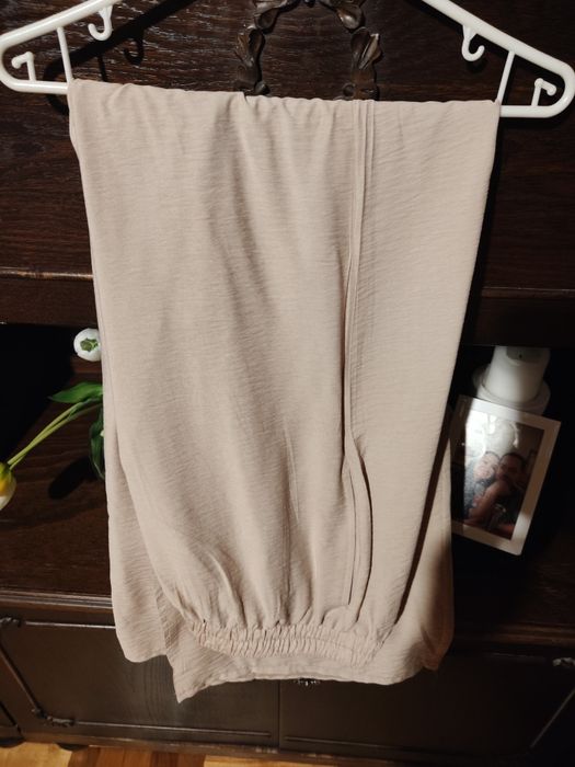 Beżowe letnie spodnie z szerokimi nogawkami 40/42 L/XL