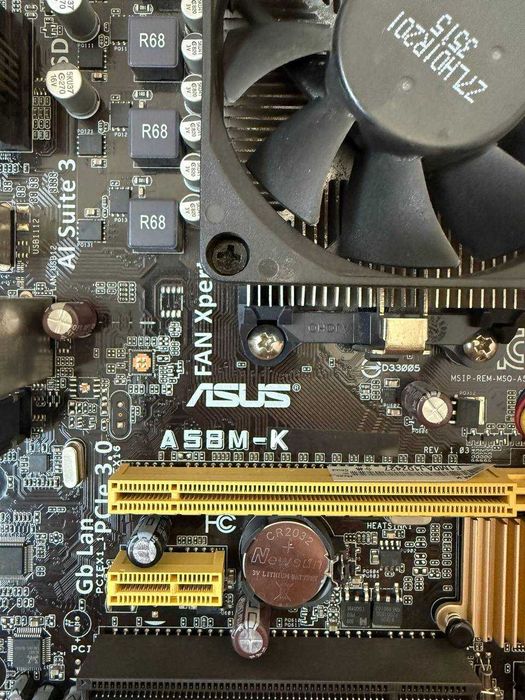 Материнська плата Asus A58M-K Socket FM2+/Процесор AMD A4-4000/Боксовий кулер