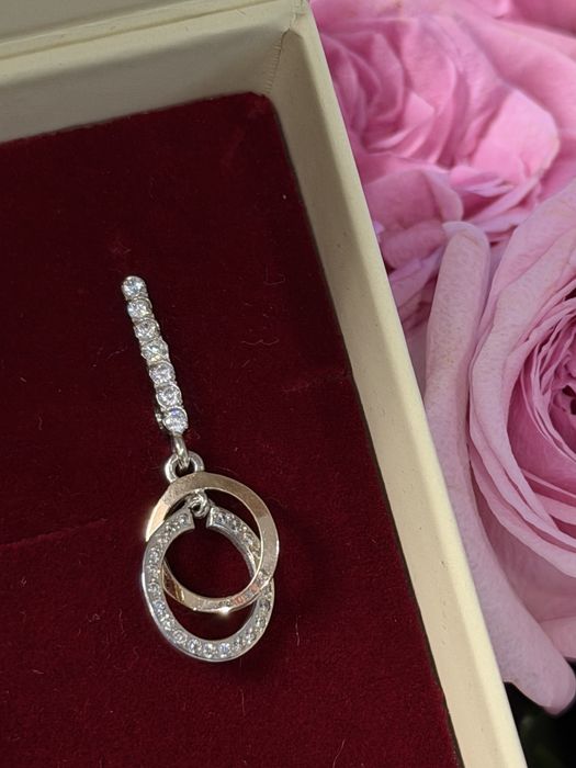 Срівбні сережки з золотими вставками та фіанітами