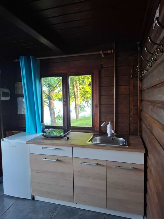 Przytulny drewniany domek + SAUNA nad jeziorem