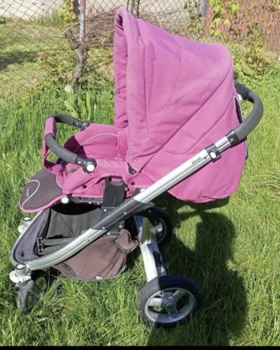 Wózek Dziecięcy 4Runner w Kolorze Fuksji z Gondolą i Wkładką Kwiatową