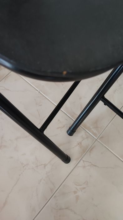 Cadeiras pretas dobráveis