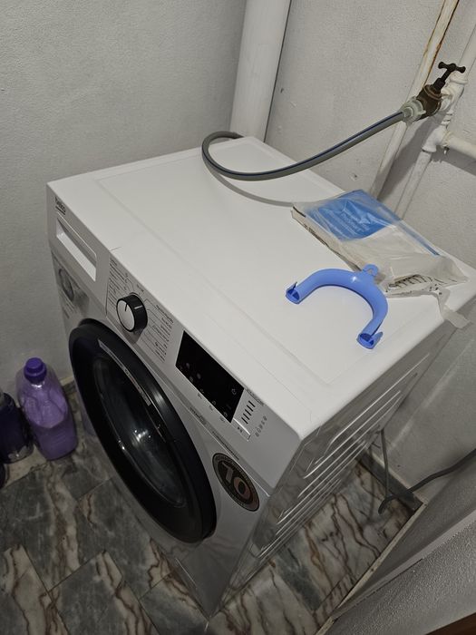 Máquina de lavar roupa beko.