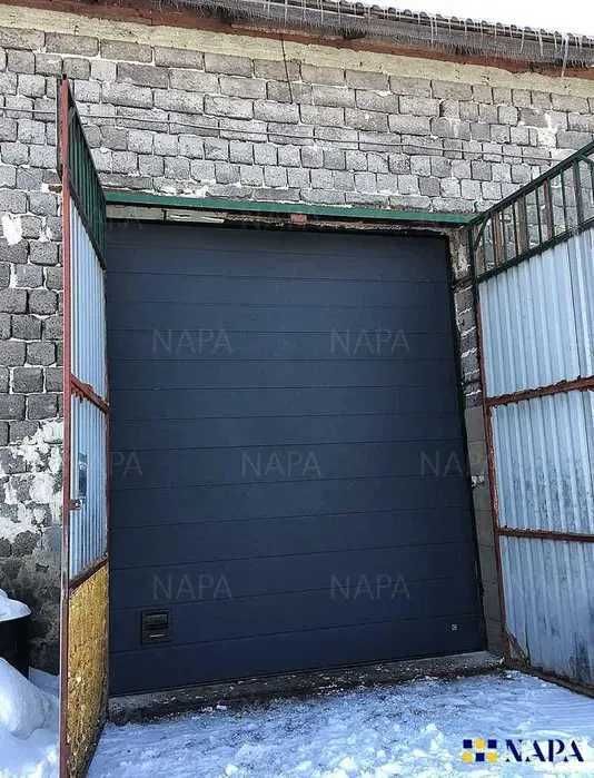 Промислові секційні ворота для СТО, складів, виробництв та комерційних об'єктів
