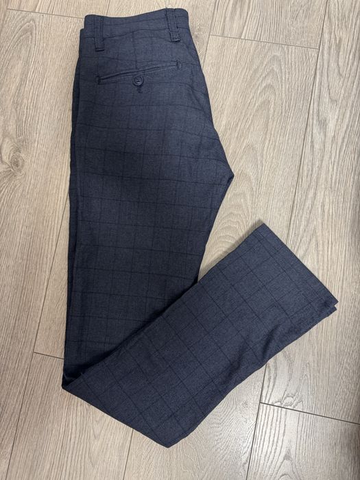 Чоловічі брюки в клітинку