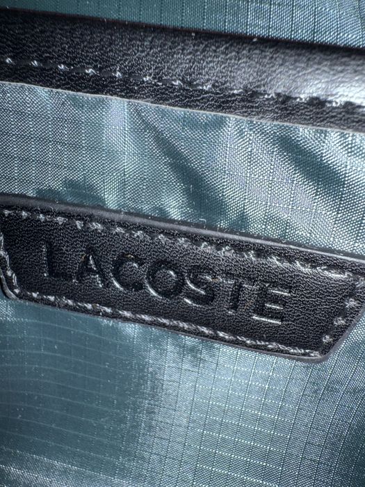 Bolsa Lacoste.