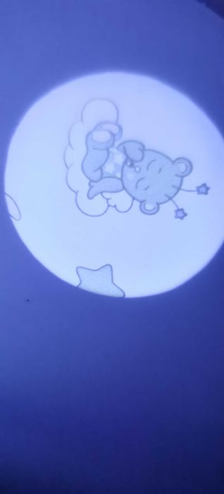 Suporte de música e luz para berço