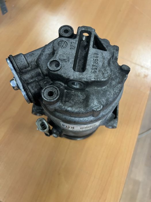 Компресор кондиціонера  Опель Астра Н