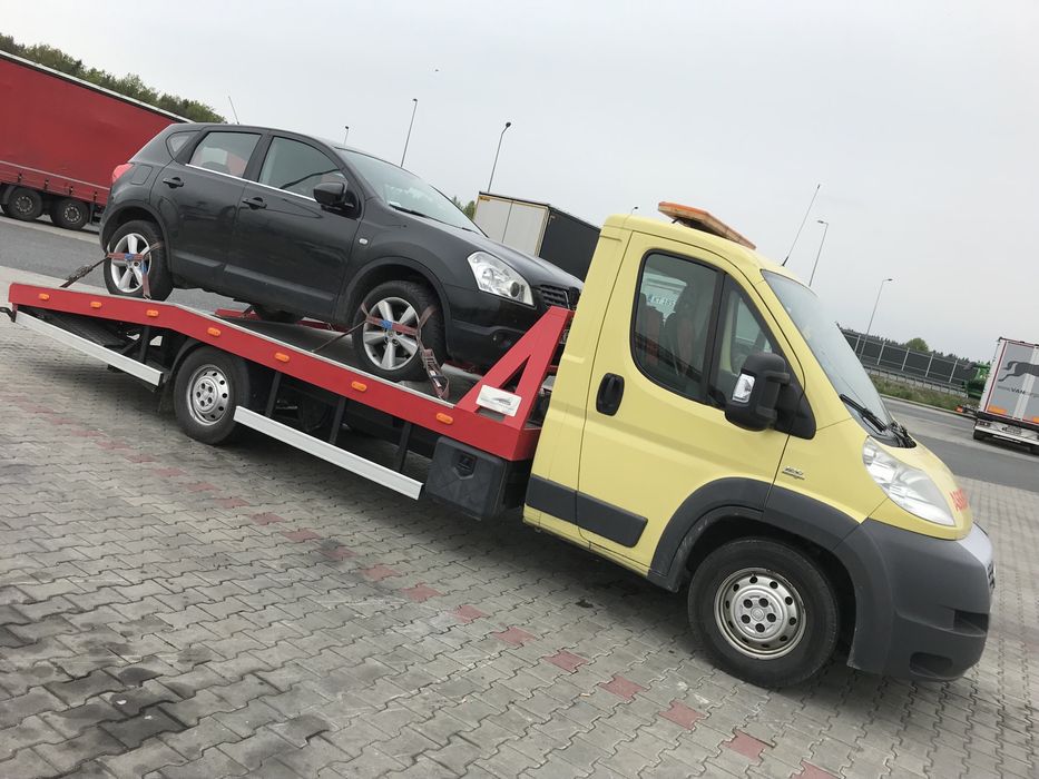 Pomoc drogowa, transport maszyn i urządzeń, holowanie, laweta 24H