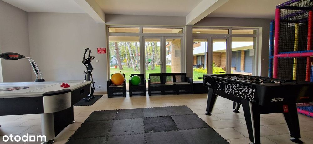Przestronne mieszkanie z balkonem i garażem w apartamentowcu