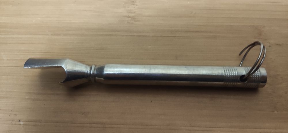 Консервний ключ, відкривачка