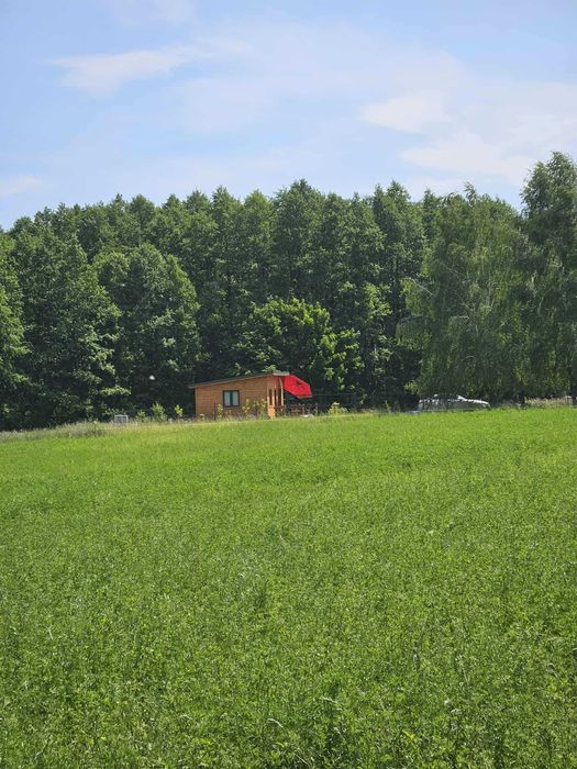 Działka budowlana z domkiem nad jeziorem Dejguny