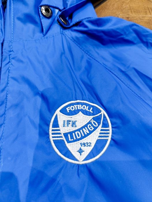 Chłopieca kurtka wiatrówka rozmiar L Nike