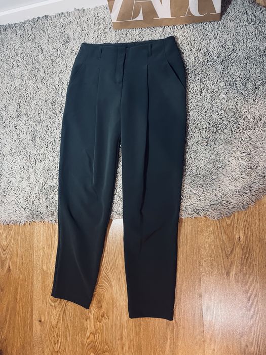 Ciemnozielone damskie spodnie s biurowe