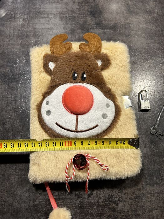 Puchaty notesik z reniferkiem, klodka