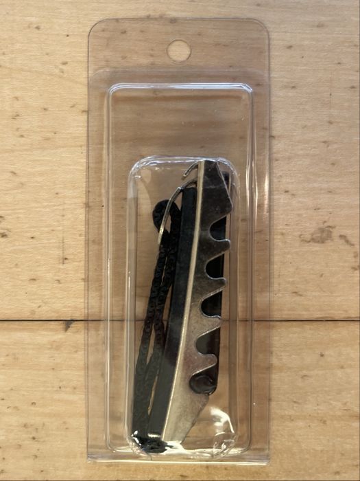 Suporte tripé p/ pautas + Palhetas e Capotraste