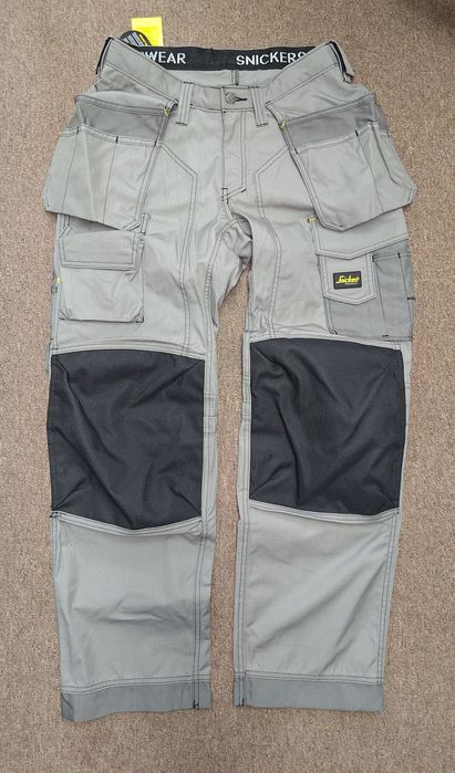 46/48 Snickers 3223 Kevlar Floor spodnie robocze dla posadzkarza brukarza parkieciarza mocne pas 84cm