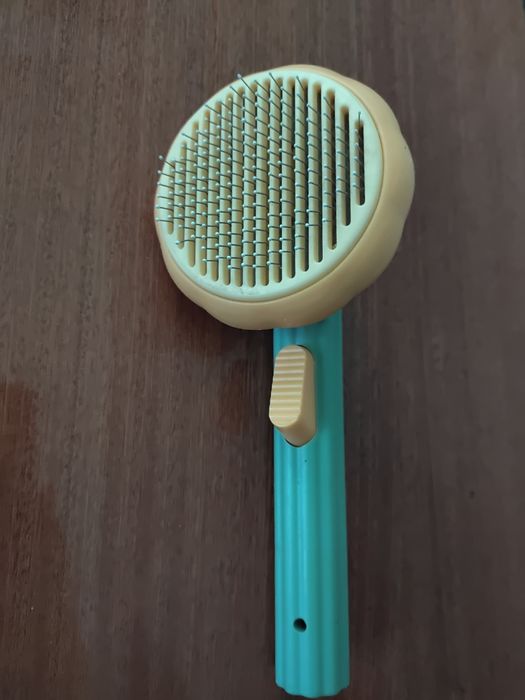 Щітка для тварин.