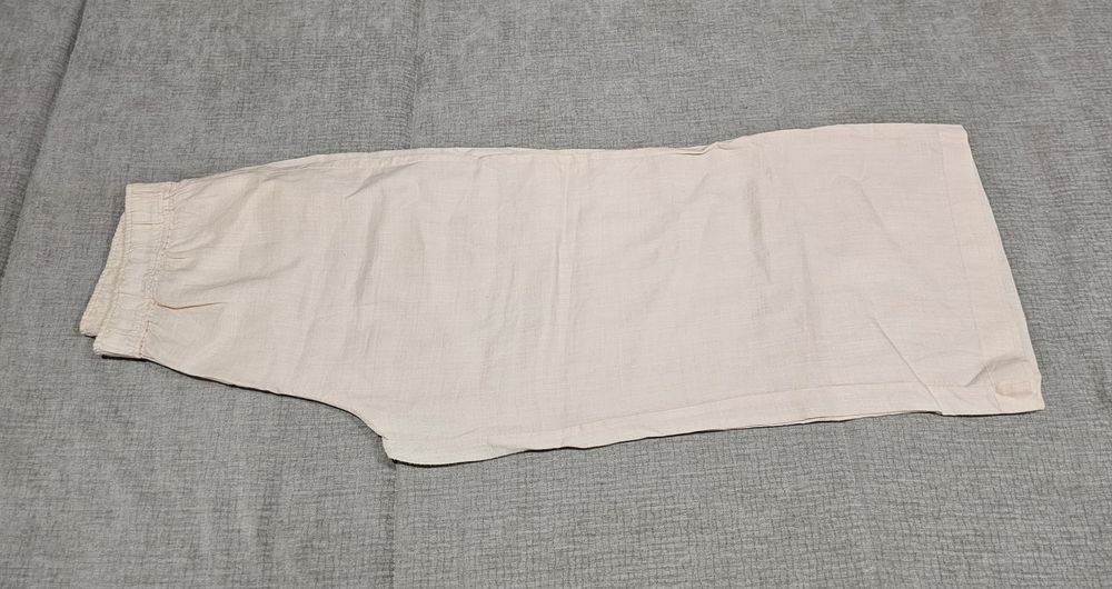 Calças tipo linho corte a direito pelo tornozelo