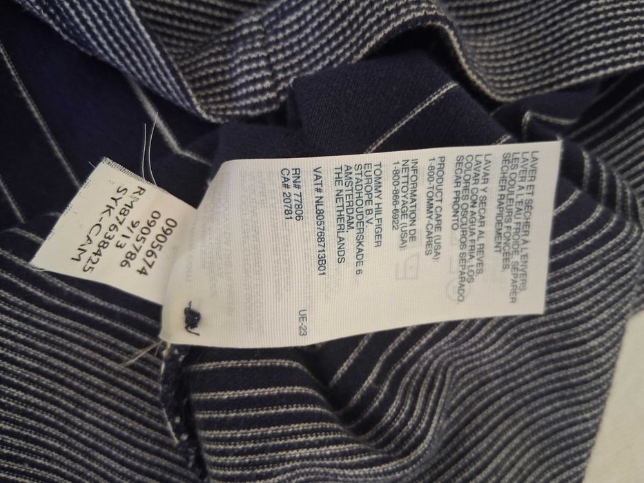 Polo granatowe w białe paski.