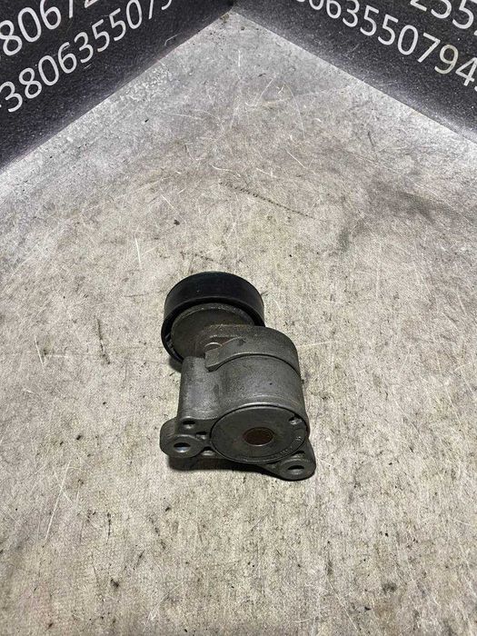 Натяжний ролик натягувач приводного ремня Mitsubishi Lancer X AA383013