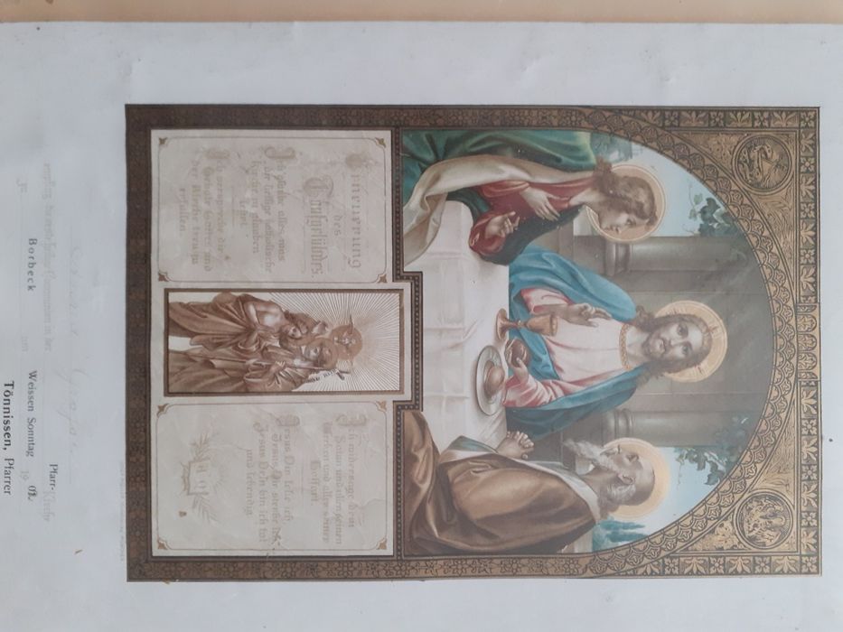 Pamiątka komunii świętej  1902 r w ramie za szybą .