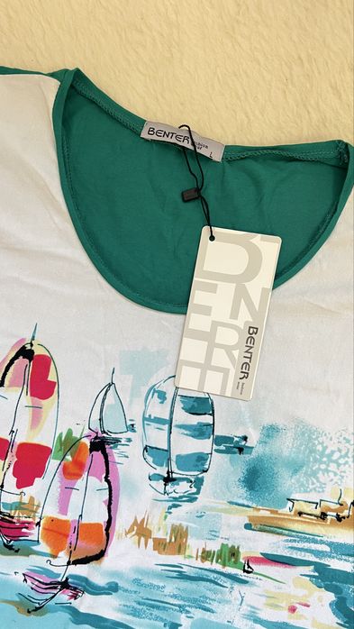 Нова жіноча футболка